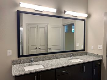 mela apartments model bathroom